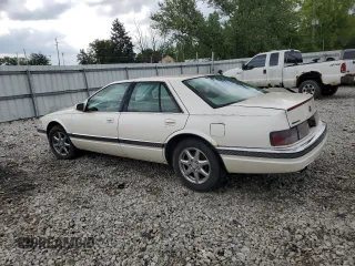 1995 Cadillac Seville Luxury SLS z VIN 1G6KS52Y7SU838169, wystawiony jako Copart lot #67941934 z przebiegiem 144 953 mil mil oraz Szkoda całkowita • Salvage title. Historia ofert i sprzedaży dostępna na DreamBid. Obrazek 2.