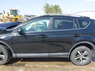 2018 Toyota RAV4 XLE with VIN 2T3WFREVXJW444002, listed as a IAAI auction lot 41795600 with 115,120 mi miles. Bid and sale history available at carsss.com. Image 14.