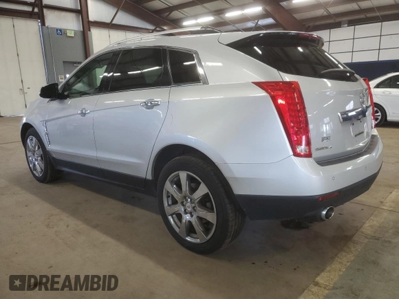 2011 Cadillac SRX Turbo Premium Collection with VIN 3GYFNKE65BS530734, listed as a Copart auction lot 51289145 with 121,879 mi miles and Salvage title. Bid and sale history available at DreamBid. Image 2.