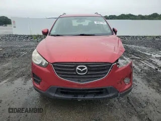2016 Mazda CX-5 Sport with VIN JM3KE4BY1G0768530, listed as a Copart auction lot 60521795 with 118,132 mi miles and Salvage title. Bid and sale history available at DreamBid. Image 5.