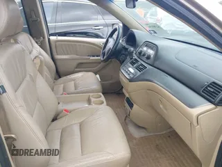 2007 Honda Odyssey EX-L z VIN 5FNRL38717B102646, wystawiony jako IAAI lot #42380196 z przebiegiem 234 088 mil mil oraz . Historia ofert i sprzedaży dostępna na DreamBid. Obrazek 5.