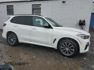 2020 BMW X5 M50i with VIN 5UXJU4C08L9C39129, listed as a Copart auction lot 48999914 with 32,851 mi miles and Salvage Title. Bid and sale history available at carsss.com. Image 4.