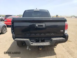 2021 Toyota Tacoma SR с VIN 3TMCZ5AN5MM417465, выставлен на аукционе Copart как лот 61266195 с пробегом 59 078 миль миль и Списание • Salvage title. История ставок и продаж доступна на DreamBid. Изображение 6.