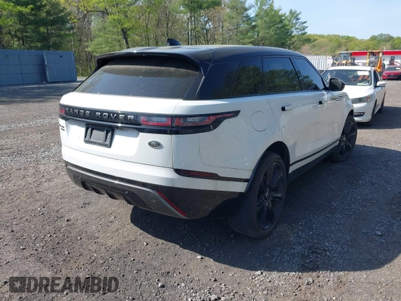 2020 Land Rover Range Rover Velar R-Dynamic S z VIN SALYK2EX9LA261388, wystawiony jako IAAI lot #42156695 z przebiegiem 35 310 mil mil oraz . Historia ofert i sprzedaży dostępna na DreamBid. Obrazek 4.