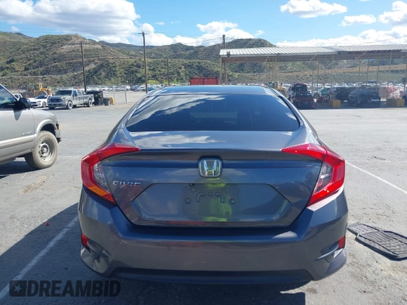 2016 Honda Civic Sedan LX with VIN 19XFC2F51GE034644, listed as a IAAI auction lot 41939884 with 59,433 mi miles. Bid and sale history available at carsss.com. Image 15.