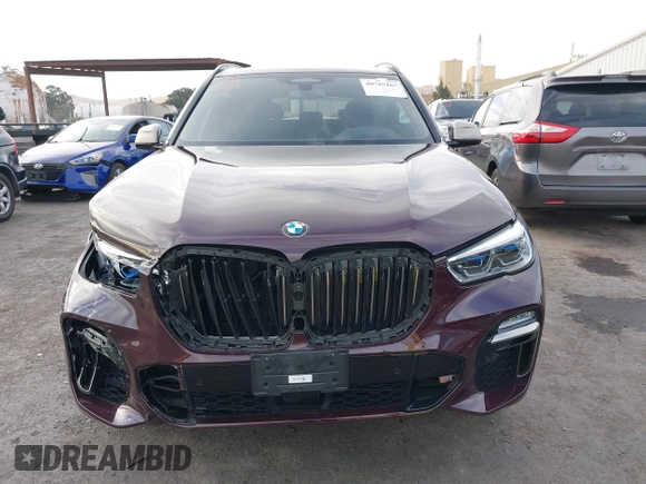2021 BMW X5 M50i with VIN 5UXJU4C04M9G03418, listed as a IAAI auction lot 40705167 with 24,073 mi miles and . Bid and sale history available at DreamBid. Image 13.