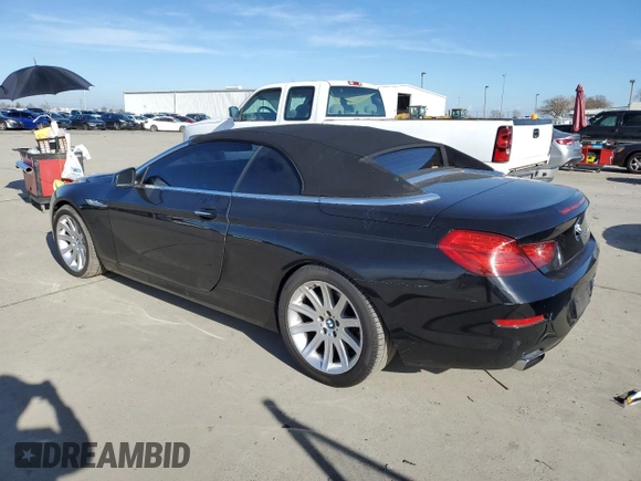 2012 BMW 6 Series 650i z VIN WBALZ3C51CDL72422, wystawiony jako Copart lot #87447914 z przebiegiem 115 376 mil mil oraz Szkody całkowita. Historia ofert i sprzedaży dostępna na DreamBid. Obrazek 2.