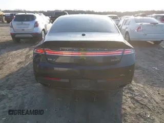2015 Lincoln MKZ z VIN 3LN6L2J96FR619104, wystawiony jako IAAI lot #41794707 z przebiegiem 140 899 mil mil oraz . Historia ofert i sprzedaży dostępna na DreamBid. Obrazek 16.