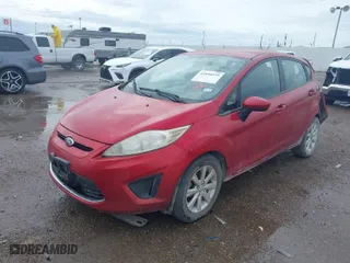 2011 Ford Fiesta SE with VIN 3FADP4EJ7BM111737, listed as a IAAI auction lot 41898939 with 198,163 mi miles. Bid and sale history available at carsss.com. Image 2.