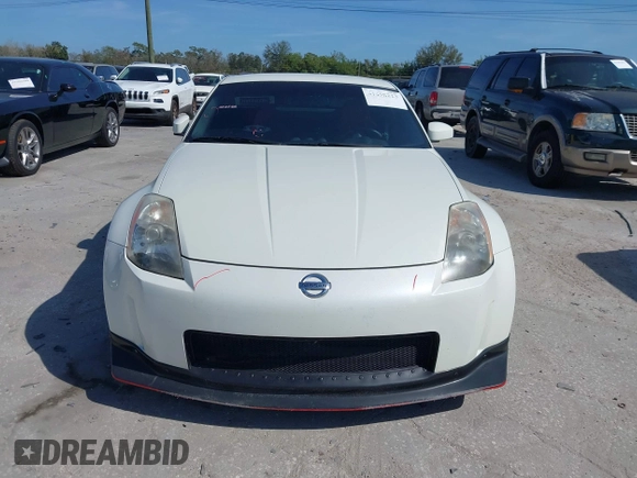 2004 Nissan 350Z Touring with VIN JN1AZ34E74T064156, listed as a IAAI auction lot 41498213 with 148,370 mi miles. Bid and sale history available at carsss.com. Image 12.