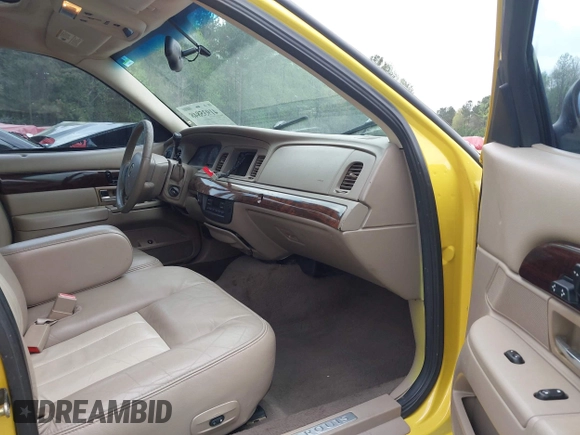 2005 Mercury Grand Marquis LS Premium z VIN 2MHHM75W05X636036, wystawiony jako IAAI lot #41935848 z przebiegiem 182 155 mil mil oraz . Historia ofert i sprzedaży dostępna na DreamBid. Obrazek 5.