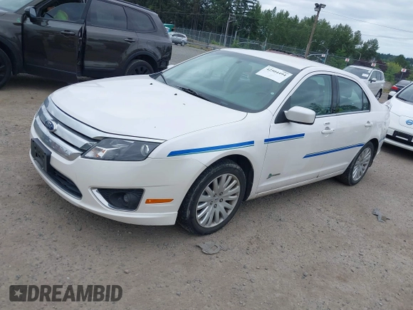 2011 Ford Fusion Hybrid z VIN 3FADP0L34BR202769, wystawiony jako IAAI lot #42504494 z przebiegiem 33 902 mil mil oraz . Historia ofert i sprzedaży dostępna na DreamBid. Obrazek 2.