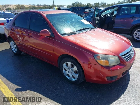 2009 Kia Spectra EX with VIN KNAFE221195606045, listed as a IAAI auction lot 41764519 with 124,577 mi miles. Bid and sale history available at carsss.com. Image 1.