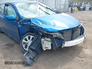 2009 Toyota Corolla with VIN JTDBL40E399046515, listed as a IAAI auction lot 42154947 with 153,041 mi miles. Bid and sale history available at carsss.com. Image 6.