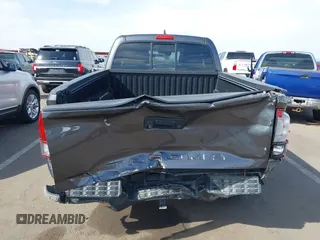 2018 Toyota Tacoma SR with VIN 5TFRX5GN8JX116802, listed as a IAAI auction lot 41879503 with 86,448 mi miles and . Bid and sale history available at DreamBid. Image 17.