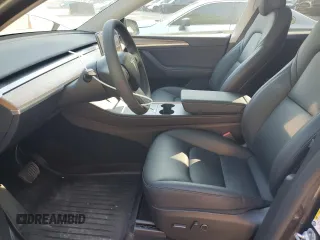 2024 Tesla Model Y Long Range with VIN 7SAYGDEE4RA299503, listed as a Copart auction lot 61950585 with 17,077 mi miles and Salvage title. Bid and sale history available at DreamBid. Image 7.