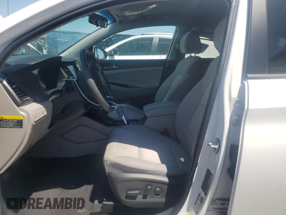 2018 Hyundai Tucson SEL z VIN KM8J33A43JU627313, wystawiony jako Copart lot #53834185 z przebiegiem 176 695 mil mil oraz Szkoda całkowita • Salvage title. Historia ofert i sprzedaży dostępna na DreamBid. Obrazek 7.