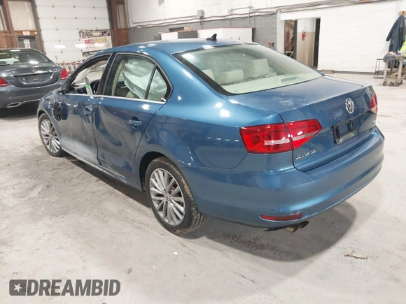 2015 Volkswagen Jetta SE z VIN 3VWD07AJ2FM315225, wystawiony jako IAAI lot #41929278 z przebiegiem 127 240 mil mil oraz . Historia ofert i sprzedaży dostępna na DreamBid. Obrazek 3.