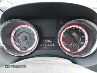 2014 Dodge Grand Caravan SXT with VIN 2C4RDGCG3ER257695, listed as a IAAI auction lot 41534568 with 116,896 mi miles and . Bid and sale history available at DreamBid. Image 7.