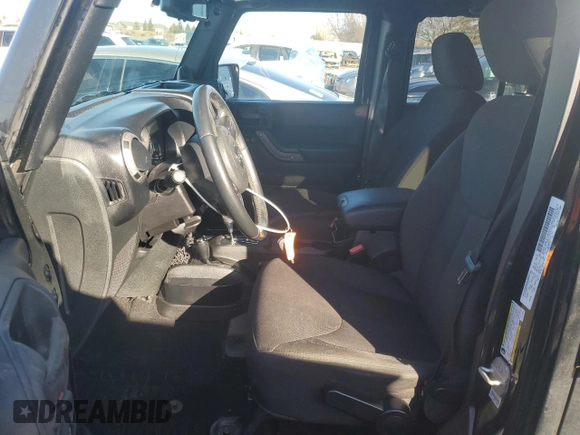 2014 Jeep Wrangler Unlimited Sport with VIN 1C4BJWDG2EL319714, listed as a Copart auction lot 47924575 with 129,294 mi miles and Salvage Title. Bid and sale history available at DreamBid. Image 7.