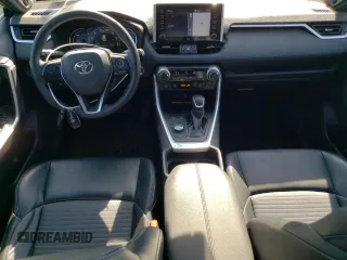2021 Toyota RAV4 Hybrid XSE with VIN 2T3E6RFV9MW013200, listed as a Copart auction lot 52163255 with 58,336 mi miles and Salvage title. Bid and sale history available at DreamBid. Image 8.