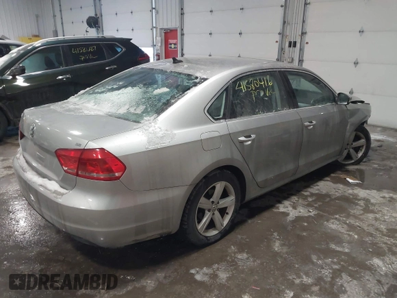 2013 Volkswagen Passat SE w/Sunroof & Nav with VIN 1VWBP7A30DC150018, listed as a IAAI auction lot 41580416 with 75,231 mi miles. Bid and sale history available at carsss.com. Image 4.