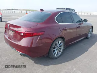 2018 Alfa Romeo Giulia with VIN ZARFAEBN8J7566581, listed as a IAAI auction lot 41524224 with 56,863 mi miles. Bid and sale history available at carsss.com. Image 4.