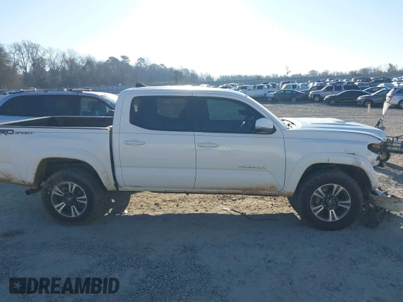 2018 Toyota Tacoma SR5 with VIN 3TMAZ5CN4JM062272, listed as a IAAI auction lot 41671472 with 114,566 mi miles and . Bid and sale history available at DreamBid. Image 14.