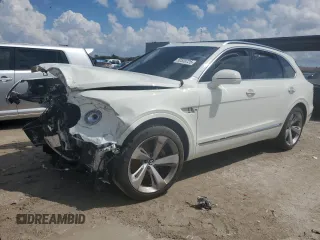 2019 Bentley Bentayga V8 z VIN SJAAM2ZV0KC024174, wystawiony jako Copart lot #50539725 z przebiegiem Nie podano mil oraz Szkoda całkowita • Salvage title. Historia ofert i sprzedaży dostępna na DreamBid. Obrazek 1.
