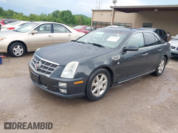 2008 Cadillac STS RWD with VIN 1G6DK67V980165768, listed as a IAAI auction lot 42185454 with 214,813 mi miles and . Bid and sale history available at DreamBid. Image 2.
