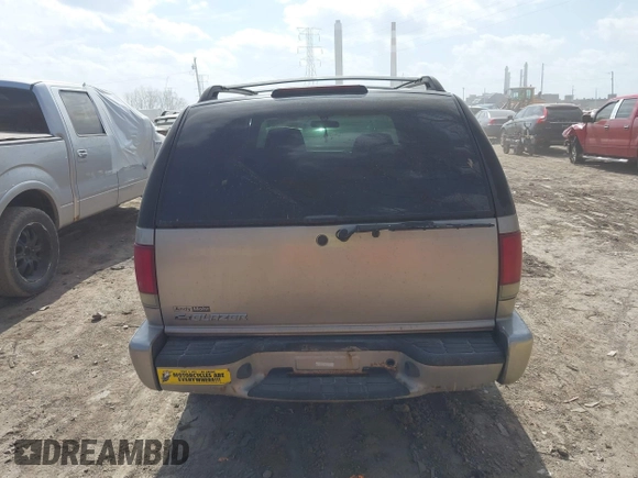 2004 Chevrolet Blazer LS z VIN 1GNDT13X04K164924, wystawiony jako IAAI lot #41803471 z przebiegiem 166 708 mil mil oraz . Historia ofert i sprzedaży dostępna na DreamBid. Obrazek 16.