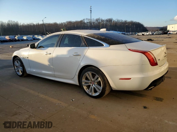 2016 Jaguar XJ R-Sport with VIN SAJWJ1CD8G8W02265, listed as a Copart auction lot 42821565 with 89,628 mi miles and Clean title. Bid and sale history available at DreamBid. Image 2.