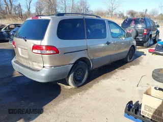 2003 Toyota Sienna LE with VIN 4T3ZF13C03U524122, listed as a IAAI auction lot 41655361 with 216,256 mi miles. Bid and sale history available at carsss.com. Image 4.