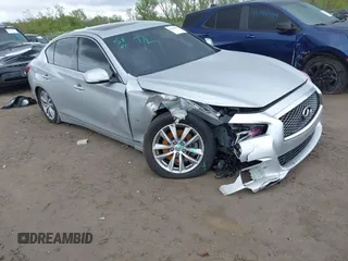 2015 Infiniti Q50 Premium z VIN JN1BV7AR8FM390785, wystawiony jako IAAI lot #42200437 z przebiegiem 94 841 mil mil oraz . Historia ofert i sprzedaży dostępna na DreamBid. Obrazek 1.