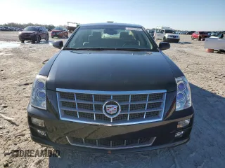 2009 Cadillac STS AWD z VIN 1G6DD67V690120833, wystawiony jako Copart lot #42502345 z przebiegiem 100 250 mil mil oraz Szkoda całkowita • Salvage title. Historia ofert i sprzedaży dostępna na DreamBid. Obrazek 5.