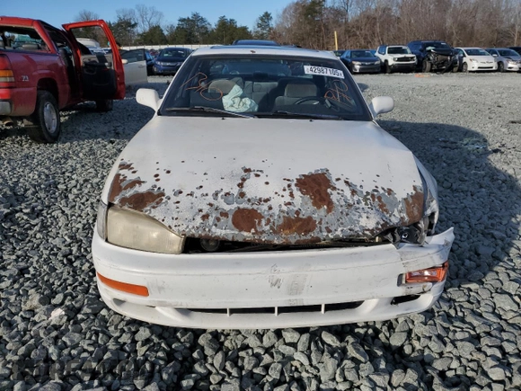 1994 Toyota Camry LE with VIN 4T1SK12E4RU396095, listed as a Copart auction lot 42987105 with 289,218 mi miles and Salvage Title. Bid and sale history available at carsss.com. Image 5.