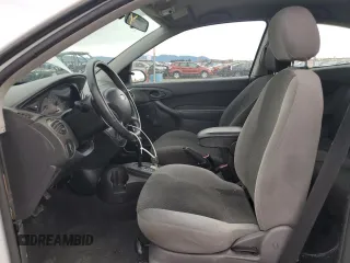 2003 Ford Focus ZX3 with VIN 3FAFP31Z83R182271, listed as a Copart auction lot 82415004 with 211,193 mi miles and Salvage title. Bid and sale history available at DreamBid. Image 7.