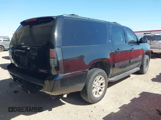 2012 GMC Yukon XL SLT with VIN 1GKS2KE77CR178173, listed as a IAAI auction lot 41778706 with 175,654 mi miles. Bid and sale history available at carsss.com. Image 4.