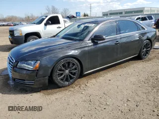 2011 Audi A8 z VIN WAURVAFD9BN012224, wystawiony jako Copart lot #50400105 z przebiegiem 130 532 mil mil oraz Szkody całkowita. Historia ofert i sprzedaży dostępna na DreamBid. Obrazek 1.