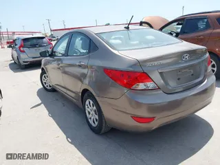 2013 Hyundai Accent GLS with VIN KMHCT4AE5DU359702, listed as a IAAI auction lot 42019779 with 113,162 mi miles. Bid and sale history available at carsss.com. Image 3.