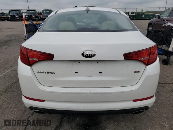2013 Kia Optima LX z VIN KNAGM4A79D5327301, wystawiony jako Copart lot #55595565 z przebiegiem 100 366 mil mil oraz Szkoda całkowita • Salvage title. Historia ofert i sprzedaży dostępna na DreamBid. Obrazek 6.