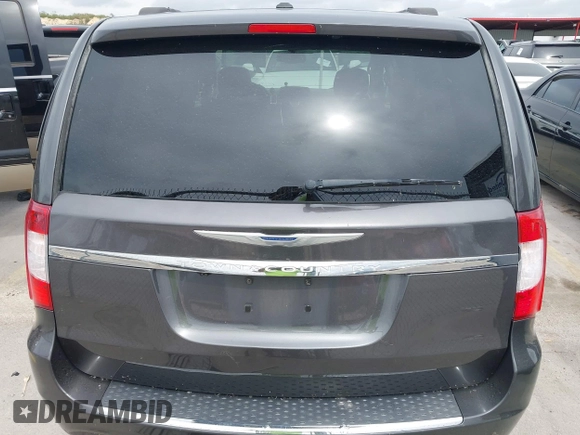 2014 Chrysler Town & Country Touring L with VIN 2C4RC1CG7ER300693, listed as a IAAI auction lot 41849463 with 174,203 mi miles and . Bid and sale history available at carsss.com. Image 16.