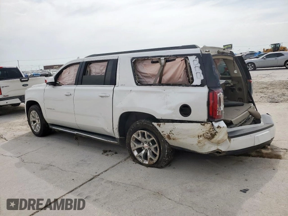 2016 GMC Yukon XL SLT z VIN 1GKS1GKC1GR252081, wystawiony jako Copart lot #53354975 z przebiegiem 200 621 mil mil oraz Szkoda całkowita • Salvage title. Historia ofert i sprzedaży dostępna na DreamBid. Obrazek 2.