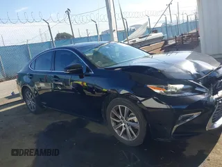2016 Lexus ES 300h z VIN JTHBW1GG1G2121262, wystawiony jako IAAI lot #41959615 z przebiegiem 131 247 mil mil oraz . Historia ofert i sprzedaży dostępna na DreamBid. Obrazek 13.