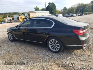 2018 BMW 7 Series 740i xDrive with VIN WBA7E4C5XJGV24003, listed as a Copart auction lot 71395443 with 63,558 mi miles. Bid and sale history available at carsss.com. Image 2.