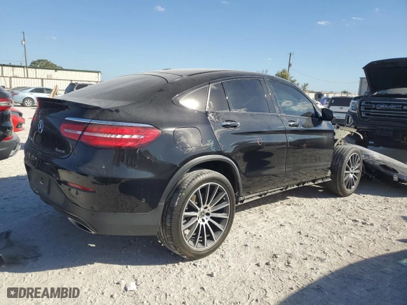 2019 Mercedes-Benz GLC with VIN WDC0J4KB9KF576828, listed as a Copart auction lot 77190044 with 104,762 mi miles and Salvage Title. Bid and sale history available at carsss.com. Image 3.