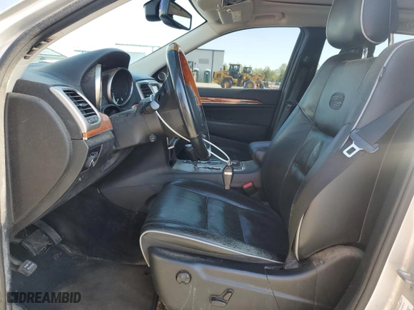 2012 Jeep Grand Cherokee Overland with VIN 1C4RJFCG5CC272580, listed as a Copart auction lot 50075735 with 209,368 mi miles and Salvage Title. Bid and sale history available at carsss.com. Image 7.