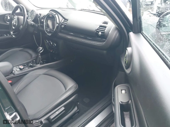 2016 MINI Cooper Clubman with VIN WMWLN5C55G2E07099, listed as a IAAI auction lot 41507429 with 53,271 mi miles. Bid and sale history available at carsss.com. Image 5.