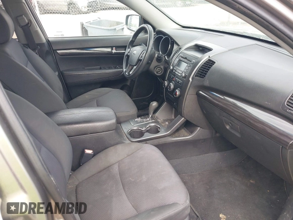 2011 Kia Sorento LX with VIN 5XYKTDA14BG141553, listed as a IAAI auction lot 42190896 with 212,690 mi miles and . Bid and sale history available at carsss.com. Image 5.