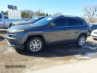 2016 Jeep Cherokee 75th Anniversary with VIN 1C4PJLCB2GW160141, listed as a IAAI auction lot 41748822 with 87,411 mi miles. Bid and sale history available at carsss.com. Image 14.
